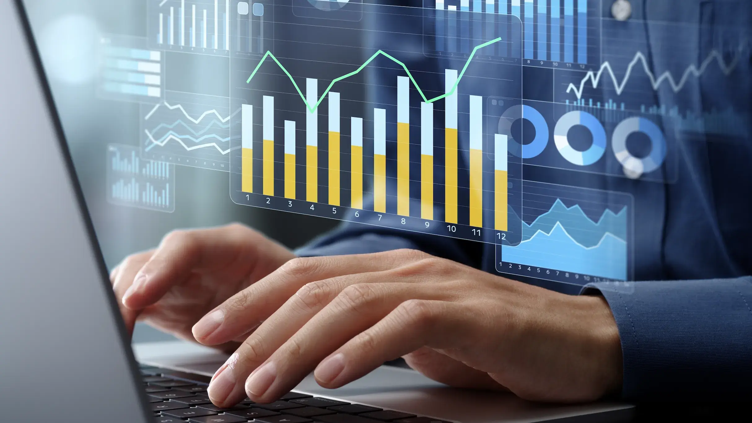 person tying on laptop