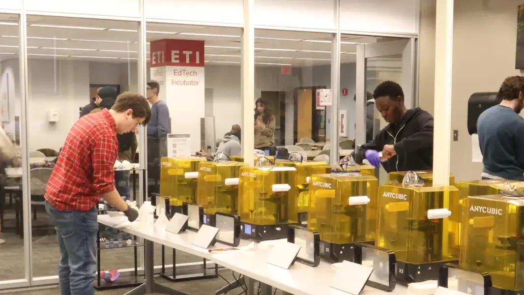People shown in the EdTech Incubator's 3D Printing Zone.