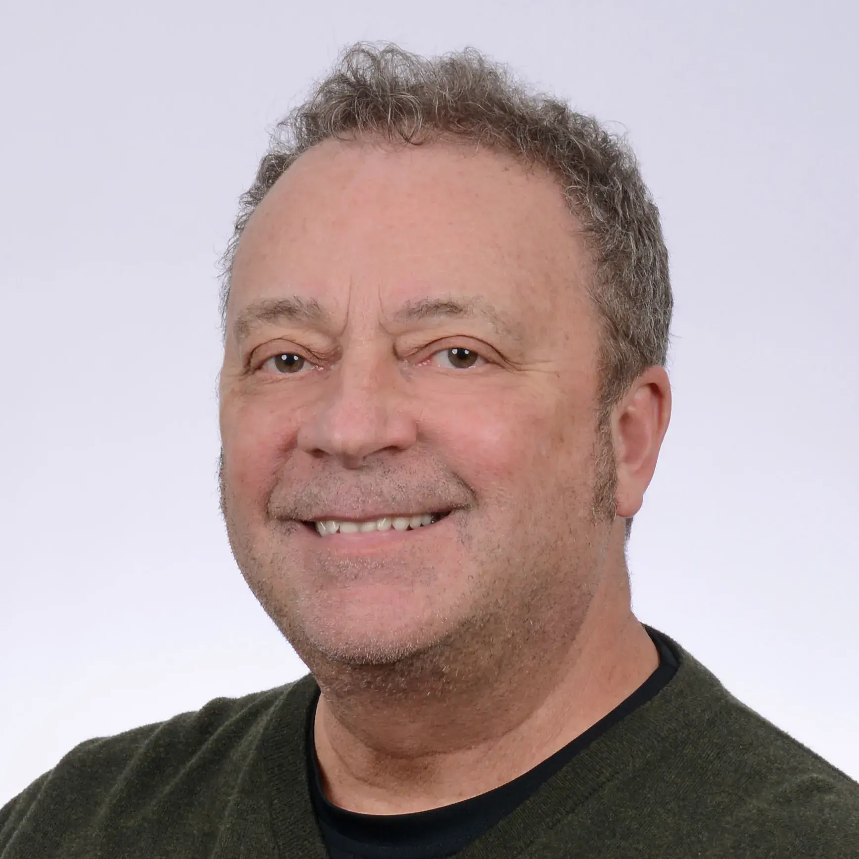 Rick Ayers, smiling.